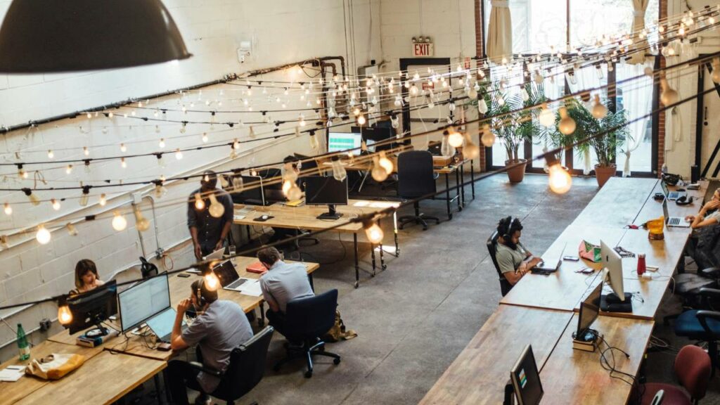 A photo of an open-plan office with lots of lightbulbs